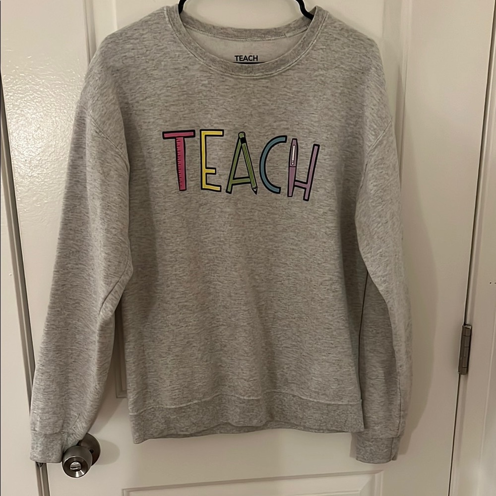 Gray Sweatshirt with Colorful 'TEACH' Print